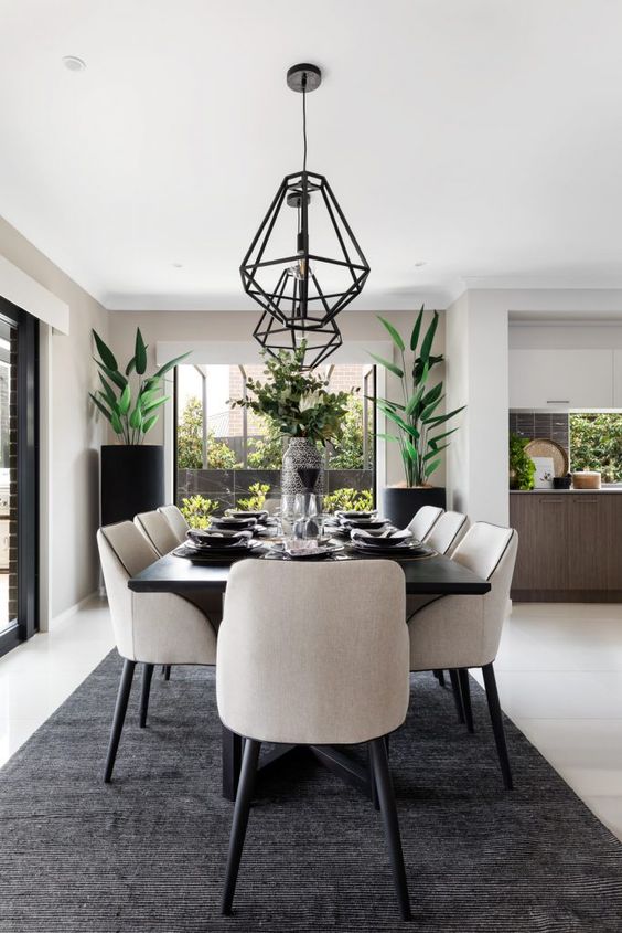 Wanderlust - where bohemian global adventure meets elegant, modern styling. Black pendant lights in the dining room, Boho Luxe dining room, stylish dining room