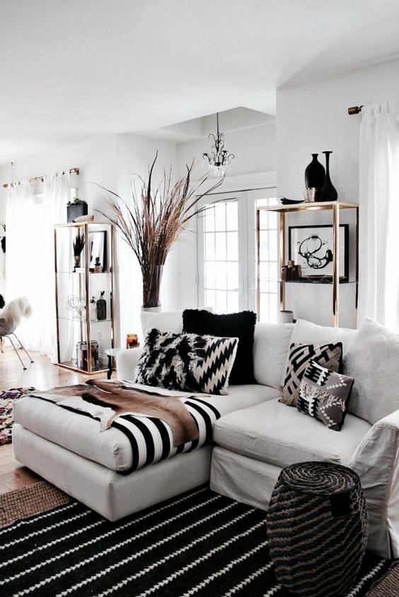 Modern Southwestern global living room design in a neutral color .