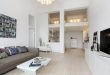 Spacious Interior Design Emphasizing Elegant Loft Living Style .
