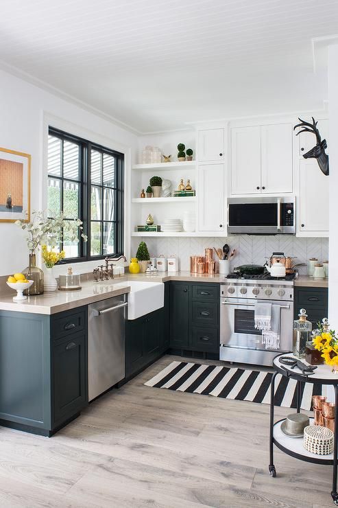 Small eclectic black and white kitchen features a black and white .