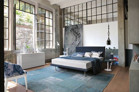 Trendy Industrial Bedroom Design with Gray and White Color Scheme .