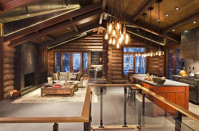 Beautiful open concept rustic kitchen/living room design by Studio .