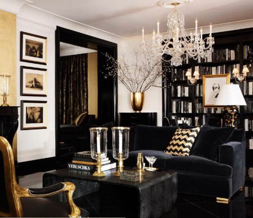 100% glamour in this black, white and gold living room! The .