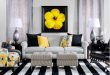 Contemporary living room with black, white and yellow accents .