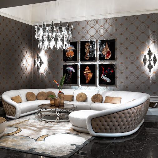 Luxury living room in updated Hollywood Regency style .