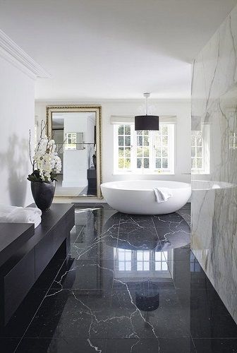 Modern black and white luxury bathroom design. See more .