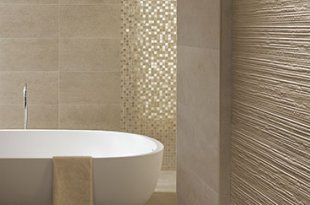 Minimalist bathroom design with textured walls from FCP Ceramics .