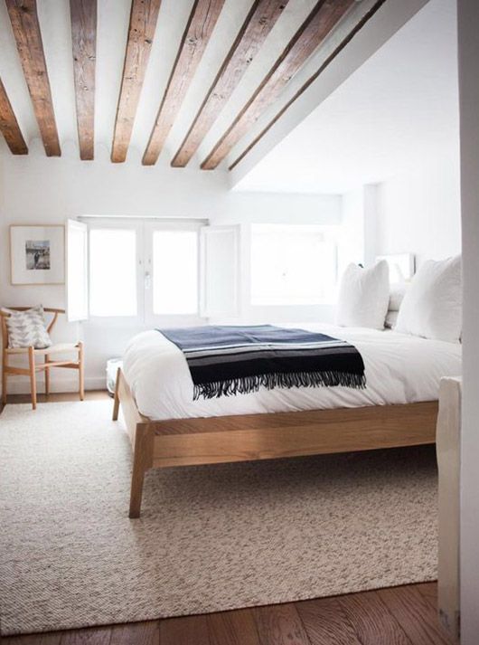 Minimalist bedroom with modern wood beam ceiling. home decor .