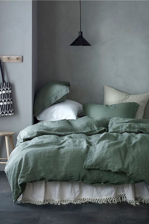Modern Scandinavian bedroom in shades of green. | Bedroom interior .