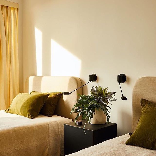 minimalist eclectic hotel room, natural light, minimalist decor .