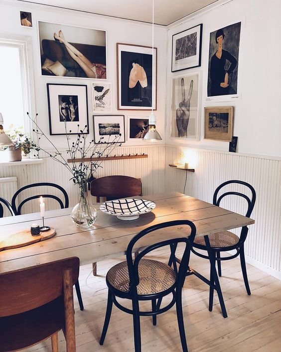 Modern Scandinavian Design Interior Dining Area with Painting Wall .