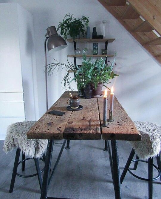 Gorgeous rustic Scandinavian kitchen table. The potted plant and .