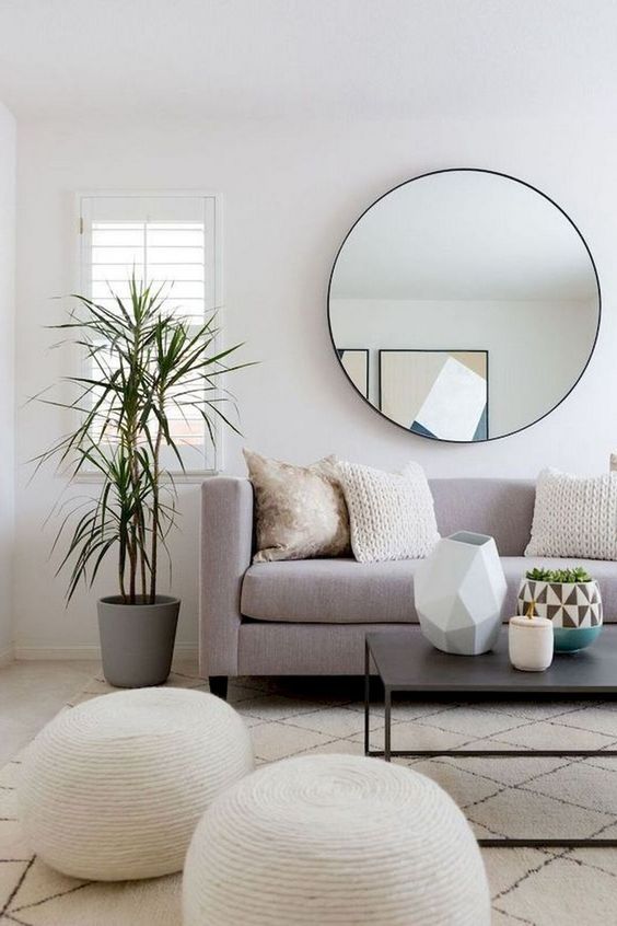 Modern Scandinavian Living Room with light details and green .