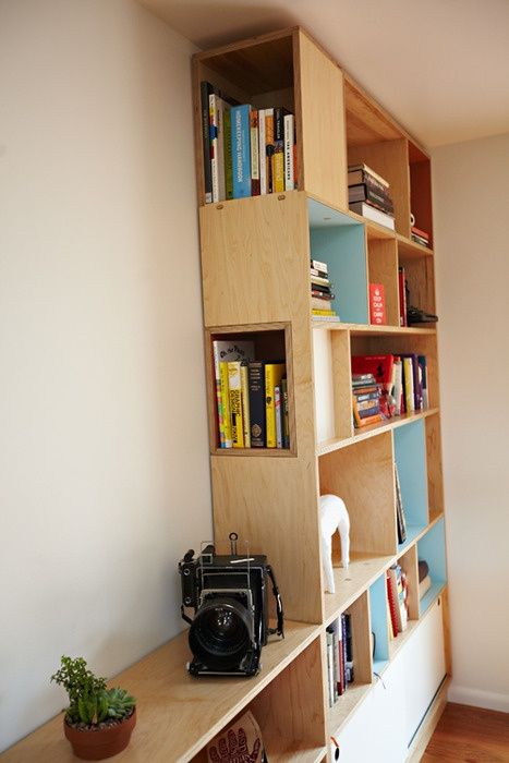 Kerf Design Bookcase. Cool side facing shelves. Use at desk area .