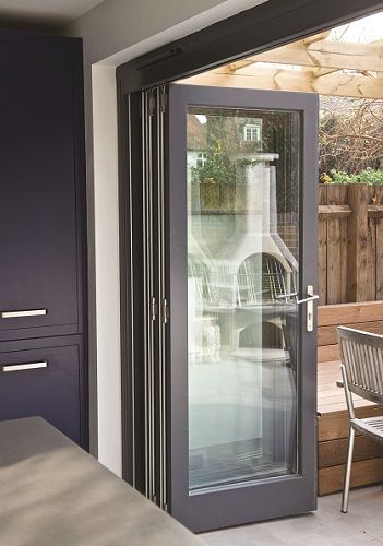 Timber Bi-Fold Door Manufactured and Installed by The Sash Window .