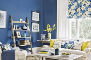 Modern blue living room with forsythia yellow accents in 2020 .